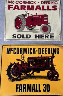 Two Metal Repro Tractor Signs.  Measure 12 x 18"