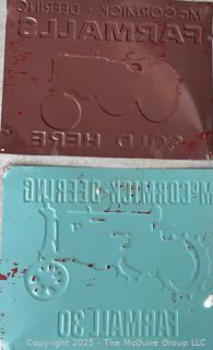 Two Metal Repro Tractor Signs.  Measure 12 x 18"