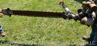 Early Two-Man Chain Saw Possibly a TITAN J Model Made in 1944<br>

<br><br>

Removal Options:<br><br> Sat (Nov 8) & Sun (Nov 9) 11-3pm, 56 Scotch Hill Rd., Cambridge NY 12816<br><br>

Sat (Nov 15) 12-2pm, TMG Warehouse, 2800 Juniper St., Fairfax, VA 22031<br><br>

Request Shipping (david@themcguiregroupllc.com)