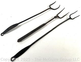 Three (3) Forged Wrought Iron Hearth Forks<br>

<br><br>

Removal Options:<br><br> Sat (Nov 8) & Sun (Nov 9) 11-3pm, 56 Scotch Hill Rd., Cambridge NY 12816<br><br>

Sat (Nov 15) 12-2pm, TMG Warehouse, 2800 Juniper St., Fairfax, VA 22031<br><br>

Request Shipping (david@themcguiregroupllc.com)