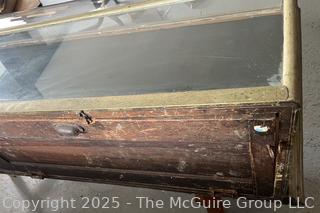 Curved Glass and Plexiglass  Countertop Display Cabinet w/ Two Fold Down Hinged Panels on Back. Missing one Panel of Glass as Shown in Photos 58"L<br>

<br><br>

Removal Options:<br><br> Sat (Nov 8) & Sun (Nov 9) 11-3pm, 56 Scotch Hill Rd., Cambridge NY 12816<br><br>

