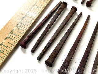 Group of Hammered Square Carpentry Nails<br>

<br><br>

Removal Options:<br><br> Sat (Nov 8) & Sun (Nov 9) 11-3pm, 56 Scotch Hill Rd., Cambridge NY 12816<br><br>

Sat (Nov 15) 12-2pm, TMG Warehouse, 2800 Juniper St., Fairfax, VA 22031<br><br>

Request Shipping (david@themcguiregroupllc.com)