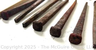 Group of Hammered Square Carpentry Nails<br>

<br><br>

Removal Options:<br><br> Sat (Nov 8) & Sun (Nov 9) 11-3pm, 56 Scotch Hill Rd., Cambridge NY 12816<br><br>

Sat (Nov 15) 12-2pm, TMG Warehouse, 2800 Juniper St., Fairfax, VA 22031<br><br>

Request Shipping (david@themcguiregroupllc.com)