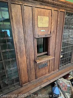 Oak US Post Office Unit with Clerk's Window, Mail Slot, and 198 PO Box boxesfrom the Hebron, NY, Post Office, Made by The Postmasters Supply Co., Baltimore, MD with  1872 certificate signed by US Postmaster General appointing John Powell as postmaster of Hebron, NY (WAS 424)<br>

<br><br>

Removal Options:<br><br> Sat (Nov 8) & Sun (Nov 9) 11-3pm, 56 Scotch Hill Rd., Cambridge NY 12816 <br><br>

Sat (Nov 15) 12-2pm, TMG Warehouse, 2800 Juniper St., Fairfax, VA 22031<br><br>

Request Shipping (david@themcguiregroupllc.com)