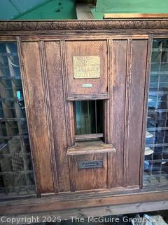Oak US Post Office Unit with Clerk's Window, Mail Slot, and 198 PO Box boxesfrom the Hebron, NY, Post Office, Made by The Postmasters Supply Co., Baltimore, MD with  1872 certificate signed by US Postmaster General appointing John Powell as postmaster of Hebron, NY (WAS 424)<br>

<br><br>

Removal Options:<br><br> Sat (Nov 8) & Sun (Nov 9) 11-3pm, 56 Scotch Hill Rd., Cambridge NY 12816 <br><br>

Sat (Nov 15) 12-2pm, TMG Warehouse, 2800 Juniper St., Fairfax, VA 22031<br><br>

Request Shipping (david@themcguiregroupllc.com)