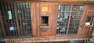 Oak US Post Office Unit with Clerk's Window, Mail Slot, and 198 PO Box boxesfrom the Hebron, NY, Post Office, Made by The Postmasters Supply Co., Baltimore, MD with  1872 certificate signed by US Postmaster General appointing John Powell as postmaster of Hebron, NY (WAS 424)<br>

<br><br>

Removal Options:<br><br> Sat (Nov 8) & Sun (Nov 9) 11-3pm, 56 Scotch Hill Rd., Cambridge NY 12816 <br><br>

Sat (Nov 15) 12-2pm, TMG Warehouse, 2800 Juniper St., Fairfax, VA 22031<br><br>

Request Shipping (david@themcguiregroupllc.com)