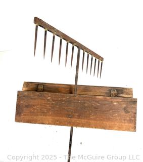 Wooden and Steel Tined Specialized Rake w/ Fitted Box Cover<br>

<br><br>

Removal Options:<br><br> Sat (Nov 8) & Sun (Nov 9) 11-3pm, 56 Scotch Hill Rd., Cambridge NY 12816<br><br>

Sat (Nov 15) 12-2pm, TMG Warehouse, 2800 Juniper St., Fairfax, VA 22031<br><br>

