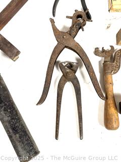Farm Bench Tools Including Leather Hole Punch, Hand Saw Set Tooth Sharpener, Clamps, Marking Gage and Hammers<br>

<br><br>

Removal Options:<br><br> Sat (Nov 8) & Sun (Nov 9) 11-3pm, 56 Scotch Hill Rd., Cambridge NY 12816<br><br>

