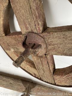 19th C Wooden Wagon Wheel with Forged Iron Rim (16"D), with Singletree Yoke Harnesses<br>

<br><br>

Removal Options:<br><br> Sat (Nov 8) & Sun (Nov 9) 11-3pm, 56 Scotch Hill Rd., Cambridge NY 12816<br><br>

