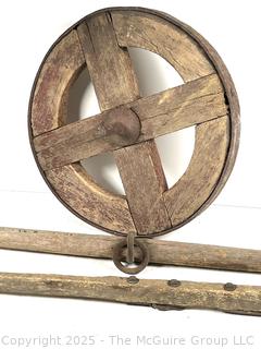 19th C Wooden Wagon Wheel with Forged Iron Rim (16"D), with Singletree Yoke Harnesses<br>

<br><br>

Removal Options:<br><br> Sat (Nov 8) & Sun (Nov 9) 11-3pm, 56 Scotch Hill Rd., Cambridge NY 12816<br><br>

