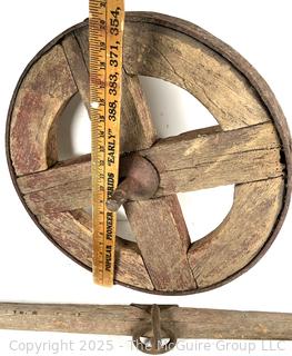 19th C Wooden Wagon Wheel with Forged Iron Rim (16"D), with Singletree Yoke Harnesses<br>

<br><br>

Removal Options:<br><br> Sat (Nov 8) & Sun (Nov 9) 11-3pm, 56 Scotch Hill Rd., Cambridge NY 12816<br><br>

