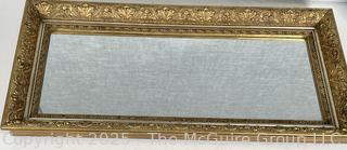Framed Wall Mirror.  Measures 14 x 28" <br>

<br><br>

Removal Options:<br><br> Sat (Nov 8) & Sun (Nov 9) 11-3pm, 56 Scotch Hill Rd., Cambridge NY 12816<br><br>

Sat (Nov 15) 12-2pm, TMG Warehouse, 2800 Juniper St., Fairfax, VA 22031<br><br>

Request Shipping (david@themcguiregroupllc.com)