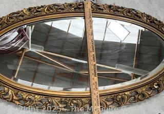 Framed Oval Beveled Glass Wall Mirror. Measures 26 x 42"<br>

<br><br>

Removal Options:<br><br> Sat (Nov 8) & Sun (Nov 9) 11-3pm, 56 Scotch Hill Rd., Cambridge NY 12816<br><br>

