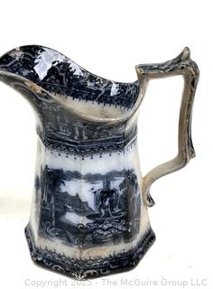 Two (2) Staffordshire Blue Transferware Pitchers<br>

<br><br>

Removal Options:<br><br> Sat (Nov 8) & Sun (Nov 9) 11-3pm, 56 Scotch Hill Rd., Cambridge NY 12816<br><br>

Sat (Nov 15) 12-2pm, TMG Warehouse, 2800 Juniper St., Fairfax, VA 22031<br><br>

Request Shipping (david@themcguiregroupllc.com) 