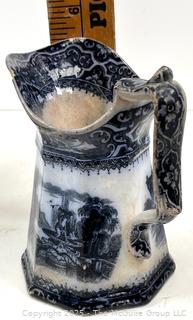 Two (2) Staffordshire Blue Transferware Pitchers<br>

<br><br>

Removal Options:<br><br> Sat (Nov 8) & Sun (Nov 9) 11-3pm, 56 Scotch Hill Rd., Cambridge NY 12816<br><br>

Sat (Nov 15) 12-2pm, TMG Warehouse, 2800 Juniper St., Fairfax, VA 22031<br><br>

Request Shipping (david@themcguiregroupllc.com) 