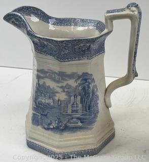 Two (2) Staffordshire Blue Transferware Pitchers<br>

<br><br>

Removal Options:<br><br> Sat (Nov 8) & Sun (Nov 9) 11-3pm, 56 Scotch Hill Rd., Cambridge NY 12816<br><br>

Sat (Nov 15) 12-2pm, TMG Warehouse, 2800 Juniper St., Fairfax, VA 22031<br><br>

Request Shipping (david@themcguiregroupllc.com) 