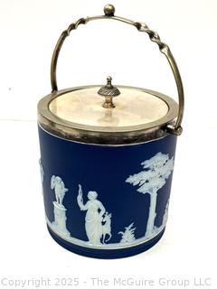 Wedgwood Jasperware Blue Biscuit Barrel with Twisted Handle<br>

<br><br>

Removal Options:<br><br> Sat (Nov 8) & Sun (Nov 9) 11-3pm, 56 Scotch Hill Rd., Cambridge NY 12816<br><br>

Sat (Nov 15) 12-2pm, TMG Warehouse, 2800 Juniper St., Fairfax, VA 22031<br><br>

Request Shipping (david@themcguiregroupllc.com) 