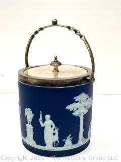 Wedgwood Jasperware Blue Biscuit Barrel with Twisted Handle<br>

<br><br>

Removal Options:<br><br> Sat (Nov 8) & Sun (Nov 9) 11-3pm, 56 Scotch Hill Rd., Cambridge NY 12816<br><br>

Sat (Nov 15) 12-2pm, TMG Warehouse, 2800 Juniper St., Fairfax, VA 22031<br><br>

Request Shipping (david@themcguiregroupllc.com) 