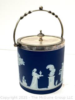 Wedgwood Jasperware Blue Biscuit Barrel with Twisted Handle<br>

<br><br>

Removal Options:<br><br> Sat (Nov 8) & Sun (Nov 9) 11-3pm, 56 Scotch Hill Rd., Cambridge NY 12816<br><br>

Sat (Nov 15) 12-2pm, TMG Warehouse, 2800 Juniper St., Fairfax, VA 22031<br><br>

Request Shipping (david@themcguiregroupllc.com) 