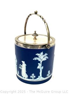 Wedgwood Jasperware Blue Biscuit Barrel with Twisted Handle<br>

<br><br>

Removal Options:<br><br> Sat (Nov 8) & Sun (Nov 9) 11-3pm, 56 Scotch Hill Rd., Cambridge NY 12816<br><br>

Sat (Nov 15) 12-2pm, TMG Warehouse, 2800 Juniper St., Fairfax, VA 22031<br><br>

Request Shipping (david@themcguiregroupllc.com) 