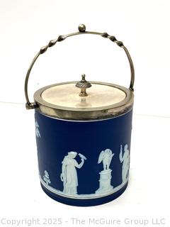 Wedgwood Jasperware Blue Biscuit Barrel with Twisted Handle<br>

<br><br>

Removal Options:<br><br> Sat (Nov 8) & Sun (Nov 9) 11-3pm, 56 Scotch Hill Rd., Cambridge NY 12816<br><br>

Sat (Nov 15) 12-2pm, TMG Warehouse, 2800 Juniper St., Fairfax, VA 22031<br><br>

Request Shipping (david@themcguiregroupllc.com) 
