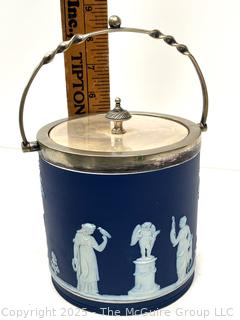 Wedgwood Jasperware Blue Biscuit Barrel with Twisted Handle<br>

<br><br>

Removal Options:<br><br> Sat (Nov 8) & Sun (Nov 9) 11-3pm, 56 Scotch Hill Rd., Cambridge NY 12816<br><br>

Sat (Nov 15) 12-2pm, TMG Warehouse, 2800 Juniper St., Fairfax, VA 22031<br><br>

Request Shipping (david@themcguiregroupllc.com) 