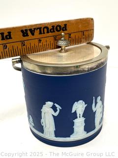 Wedgwood Jasperware Blue Biscuit Barrel with Twisted Handle<br>

<br><br>

Removal Options:<br><br> Sat (Nov 8) & Sun (Nov 9) 11-3pm, 56 Scotch Hill Rd., Cambridge NY 12816<br><br>

Sat (Nov 15) 12-2pm, TMG Warehouse, 2800 Juniper St., Fairfax, VA 22031<br><br>

Request Shipping (david@themcguiregroupllc.com) 