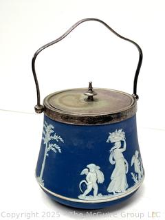 Wedgwood Light Blue Bell Shape Jasperware Biscuit Barrel<br>

<br><br>

Removal Options:<br><br> Sat (Nov 8) & Sun (Nov 9) 11-3pm, 56 Scotch Hill Rd., Cambridge NY 12816<br><br>

Sat (Nov 15) 12-2pm, TMG Warehouse, 2800 Juniper St., Fairfax, VA 22031<br><br>

Request Shipping (david@themcguiregroupllc.com)