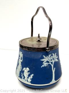 Wedgwood Light Blue Bell Shape Jasperware Biscuit Barrel<br>

<br><br>

Removal Options:<br><br> Sat (Nov 8) & Sun (Nov 9) 11-3pm, 56 Scotch Hill Rd., Cambridge NY 12816<br><br>

Sat (Nov 15) 12-2pm, TMG Warehouse, 2800 Juniper St., Fairfax, VA 22031<br><br>

Request Shipping (david@themcguiregroupllc.com)