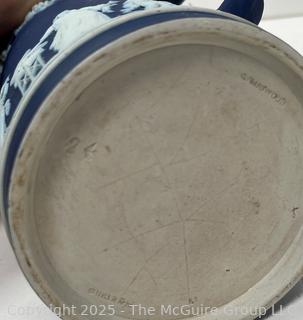 Wedgwood Jasperware Blue Tankard 5 3/8"T<br>

<br><br>

Removal Options:<br><br> Sat (Nov 8) & Sun (Nov 9) 11-3pm, 56 Scotch Hill Rd., Cambridge NY 12816<br><br>

Sat (Nov 15) 12-2pm, TMG Warehouse, 2800 Juniper St., Fairfax, VA 22031<br><br>

Request Shipping (david@themcguiregroupllc.com)