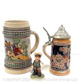 Two (2) Steins and a Figurine<br>

<br><br>

Removal Options:<br><br> Sat (Nov 8) & Sun (Nov 9) 11-3pm, 56 Scotch Hill Rd., Cambridge NY 12816<br><br>

Sat (Nov 15) 12-2pm, TMG Warehouse, 2800 Juniper St., Fairfax, VA 22031<br><br>

Request Shipping (david@themcguiregroupllc.com)