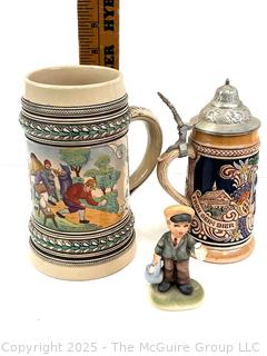 Two (2) Steins and a Figurine<br>

<br><br>

Removal Options:<br><br> Sat (Nov 8) & Sun (Nov 9) 11-3pm, 56 Scotch Hill Rd., Cambridge NY 12816<br><br>

Sat (Nov 15) 12-2pm, TMG Warehouse, 2800 Juniper St., Fairfax, VA 22031<br><br>

Request Shipping (david@themcguiregroupllc.com)