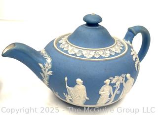 English Wedgwood Blue Jasperware Teapot<br>

<br><br>

Removal Options:<br><br> Sat (Nov 8) & Sun (Nov 9) 11-3pm, 56 Scotch Hill Rd., Cambridge NY 12816<br><br>

Sat (Nov 15) 12-2pm, TMG Warehouse, 2800 Juniper St., Fairfax, VA 22031<br><br>

Request Shipping (david@themcguiregroupllc.com) 