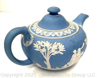 English Wedgwood Blue Jasperware Teapot<br>

<br><br>

Removal Options:<br><br> Sat (Nov 8) & Sun (Nov 9) 11-3pm, 56 Scotch Hill Rd., Cambridge NY 12816<br><br>

Sat (Nov 15) 12-2pm, TMG Warehouse, 2800 Juniper St., Fairfax, VA 22031<br><br>

Request Shipping (david@themcguiregroupllc.com) 