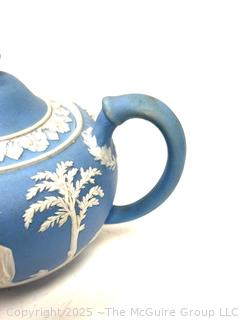 English Wedgwood Blue Jasperware Teapot<br>

<br><br>

Removal Options:<br><br> Sat (Nov 8) & Sun (Nov 9) 11-3pm, 56 Scotch Hill Rd., Cambridge NY 12816<br><br>

Sat (Nov 15) 12-2pm, TMG Warehouse, 2800 Juniper St., Fairfax, VA 22031<br><br>

Request Shipping (david@themcguiregroupllc.com) 