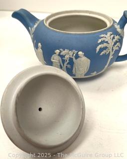 English Wedgwood Blue Jasperware Teapot<br>

<br><br>

Removal Options:<br><br> Sat (Nov 8) & Sun (Nov 9) 11-3pm, 56 Scotch Hill Rd., Cambridge NY 12816<br><br>

Sat (Nov 15) 12-2pm, TMG Warehouse, 2800 Juniper St., Fairfax, VA 22031<br><br>

Request Shipping (david@themcguiregroupllc.com) 