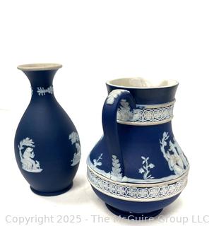 Two (2) Pieces Cobalt Blue English Wedgwood Jasperware Jug and Vase<br>

<br><br>

Removal Options:<br><br> Sat (Nov 8) & Sun (Nov 9) 11-3pm, 56 Scotch Hill Rd., Cambridge NY 12816<br><br>

Sat (Nov 15) 12-2pm, TMG Warehouse, 2800 Juniper St., Fairfax, VA 22031<br><br>

Request Shipping (david@themcguiregroupllc.com)