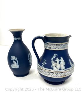 Two (2) Pieces Cobalt Blue English Wedgwood Jasperware Jug and Vase<br>

<br><br>

Removal Options:<br><br> Sat (Nov 8) & Sun (Nov 9) 11-3pm, 56 Scotch Hill Rd., Cambridge NY 12816<br><br>

Sat (Nov 15) 12-2pm, TMG Warehouse, 2800 Juniper St., Fairfax, VA 22031<br><br>

Request Shipping (david@themcguiregroupllc.com)