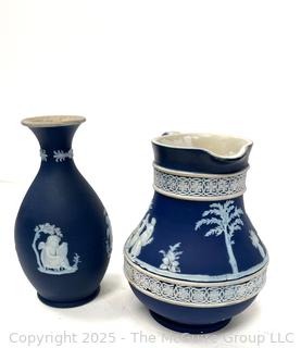 Two (2) Pieces Cobalt Blue English Wedgwood Jasperware Jug and Vase<br>

<br><br>

Removal Options:<br><br> Sat (Nov 8) & Sun (Nov 9) 11-3pm, 56 Scotch Hill Rd., Cambridge NY 12816<br><br>

Sat (Nov 15) 12-2pm, TMG Warehouse, 2800 Juniper St., Fairfax, VA 22031<br><br>

Request Shipping (david@themcguiregroupllc.com)