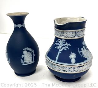 Two (2) Pieces Cobalt Blue English Wedgwood Jasperware Jug and Vase<br>

<br><br>

Removal Options:<br><br> Sat (Nov 8) & Sun (Nov 9) 11-3pm, 56 Scotch Hill Rd., Cambridge NY 12816<br><br>

Sat (Nov 15) 12-2pm, TMG Warehouse, 2800 Juniper St., Fairfax, VA 22031<br><br>

Request Shipping (david@themcguiregroupllc.com)