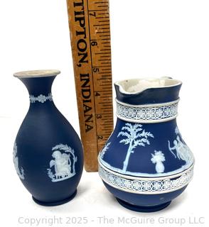 Two (2) Pieces Cobalt Blue English Wedgwood Jasperware Jug and Vase<br>

<br><br>

Removal Options:<br><br> Sat (Nov 8) & Sun (Nov 9) 11-3pm, 56 Scotch Hill Rd., Cambridge NY 12816<br><br>

Sat (Nov 15) 12-2pm, TMG Warehouse, 2800 Juniper St., Fairfax, VA 22031<br><br>

Request Shipping (david@themcguiregroupllc.com)