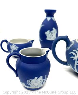 Four (4) Pieces Cobalt Blue English Wedgwood Jasperware Teapot, Creamer, Sugar and Bud Vase<br>

<br><br>

Removal Options:<br><br> Sat (Nov 8) & Sun (Nov 9) 11-3pm, 56 Scotch Hill Rd., Cambridge NY 12816<br><br>

Sat (Nov 15) 12-2pm, TMG Warehouse, 2800 Juniper St., Fairfax, VA 22031<br><br>

Request Shipping (david@themcguiregroupllc.com)