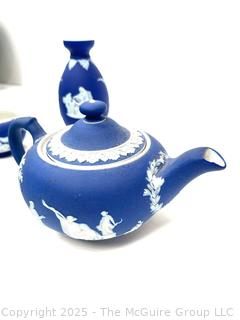 Four (4) Pieces Cobalt Blue English Wedgwood Jasperware Teapot, Creamer, Sugar and Bud Vase<br>

<br><br>

Removal Options:<br><br> Sat (Nov 8) & Sun (Nov 9) 11-3pm, 56 Scotch Hill Rd., Cambridge NY 12816<br><br>

Sat (Nov 15) 12-2pm, TMG Warehouse, 2800 Juniper St., Fairfax, VA 22031<br><br>

Request Shipping (david@themcguiregroupllc.com)
