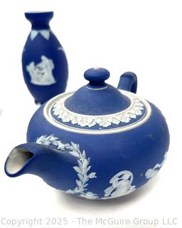 Four (4) Pieces Cobalt Blue English Wedgwood Jasperware Teapot, Creamer, Sugar and Bud Vase<br>

<br><br>

Removal Options:<br><br> Sat (Nov 8) & Sun (Nov 9) 11-3pm, 56 Scotch Hill Rd., Cambridge NY 12816<br><br>

Sat (Nov 15) 12-2pm, TMG Warehouse, 2800 Juniper St., Fairfax, VA 22031<br><br>

Request Shipping (david@themcguiregroupllc.com)