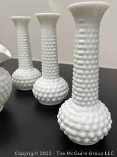 Pixel Four (4) Hobnail Milk Glass Vases<br>

<br><br>

Removal Options:<br><br> Sat (Nov 8) & Sun (Nov 9) 11-3pm, 56 Scotch Hill Rd., Cambridge NY 12816<br><br>

Sat (Nov 15) 12-2pm, TMG Warehouse, 2800 Juniper St., Fairfax, VA 22031<br><br>

Request Shipping (david@themcguiregroupllc.com)