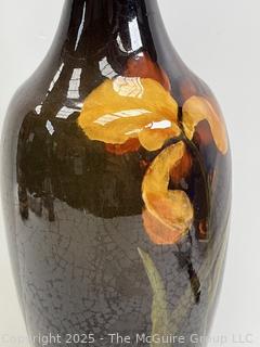Weller Art Pottery Louwelsa Iris Bottleneck Vase. Note Chip in Rim<br>

<br><br>

Removal Options:<br><br> Sat (Nov 8) & Sun (Nov 9) 11-3pm, 56 Scotch Hill Rd., Cambridge NY 12816<br><br>

Sat (Nov 15) 12-2pm, TMG Warehouse, 2800 Juniper St., Fairfax, VA 22031<br><br>

Request Shipping (david@themcguiregroupllc.com)