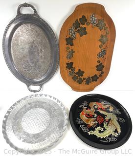 Four (4) Serving Trays<br>

<br><br>

Removal Options:<br><br> Sat (Nov 8) & Sun (Nov 9) 11-3pm, 56 Scotch Hill Rd., Cambridge NY 12816<br><br>

Sat (Nov 15) 12-2pm, TMG Warehouse, 2800 Juniper St., Fairfax, VA 22031<br><br>

Request Shipping (david@themcguiregroupllc.com)