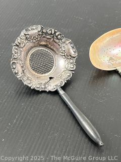 Two (2) Fancy Serving Strainers <br>

<br><br>

Removal Options:<br><br> Sat (Nov 8) & Sun (Nov 9) 11-3pm, 56 Scotch Hill Rd., Cambridge NY 12816<br><br>

Sat (Nov 15) 12-2pm, TMG Warehouse, 2800 Juniper St., Fairfax, VA 22031<br><br>

Request Shipping (david@themcguiregroupllc.com)