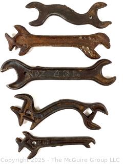 Grouping of Antique Spanner Cast Iron Wrenches Including International Harvester HE911 Model.  Such Were Sold Directly w/ Tractors and Farm Implements. <br>

<br><br>

Removal Options:<br><br> Sat (Nov 8) & Sun (Nov 9) 11-3pm, 56 Scotch Hill Rd., Cambridge NY 12816<br><br>

Sat (Nov 15) 12-2pm, TMG Warehouse, 2800 Juniper St., Fairfax, VA 22031<br><br>

Request Shipping (david@themcguiregroupllc.com)