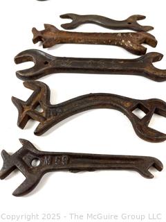 Grouping of Antique Spanner Cast Iron Wrenches Including International Harvester HE911 Model.  Such Were Sold Directly w/ Tractors and Farm Implements. <br>

<br><br>

Removal Options:<br><br> Sat (Nov 8) & Sun (Nov 9) 11-3pm, 56 Scotch Hill Rd., Cambridge NY 12816<br><br>

Sat (Nov 15) 12-2pm, TMG Warehouse, 2800 Juniper St., Fairfax, VA 22031<br><br>

Request Shipping (david@themcguiregroupllc.com)
